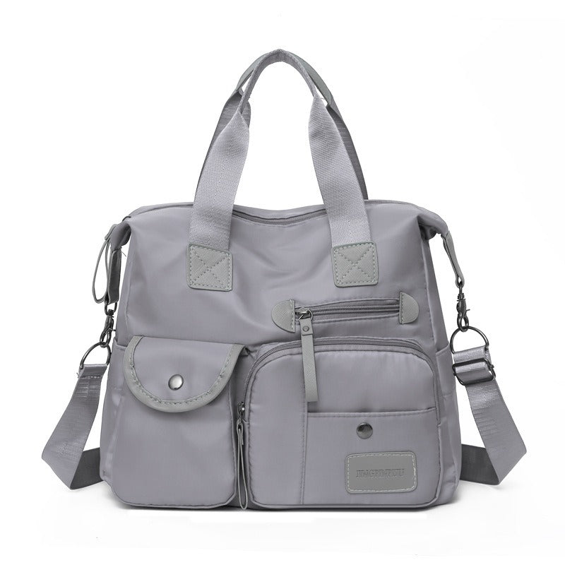 💞50K+ SOLD!👜Large Waterproof Tote Bag – Spacious main compartment, multiple pockets & 3 carrying ways. Lightweight Oxford fabric – perfect for work, shopping & travel! 💪✨