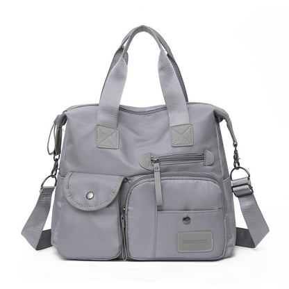 💞50K+ SOLD!👜Large Waterproof Tote Bag – Spacious main compartment, multiple pockets & 3 carrying ways. Lightweight Oxford fabric – perfect for work, shopping & travel! 💪✨
