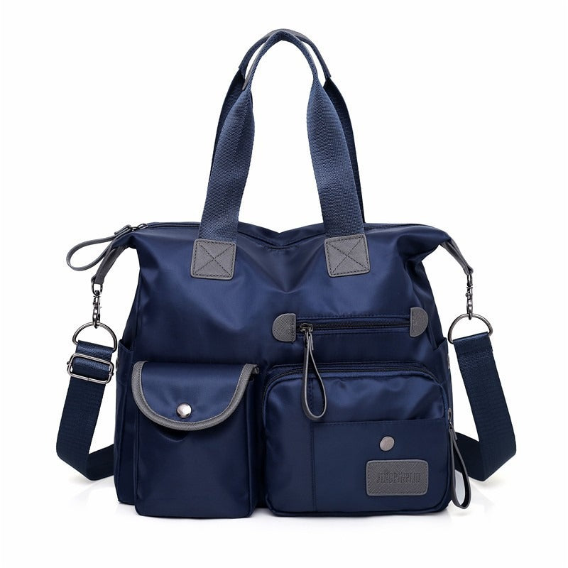 💞50K+ SOLD!👜Large Waterproof Tote Bag – Spacious main compartment, multiple pockets & 3 carrying ways. Lightweight Oxford fabric – perfect for work, shopping & travel! 💪✨